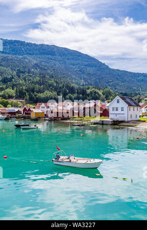 View at Solvorn, a picturesque little village with white wooden houses along Lustrafjorden on a summer day in Sogn og Fjordane county in Norway. Stock Photo