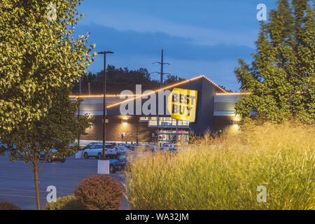 NEW HARTFORD, NEW YORK - AUG 16, 2019: Night view of Best Buy, is a major retail chain that sells all kinds of consumer electronics products. Stock Photo