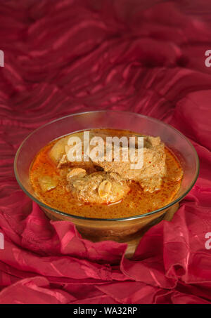 Massaman pork curry in bowl . Thai style coconut milk curry Stock Photo