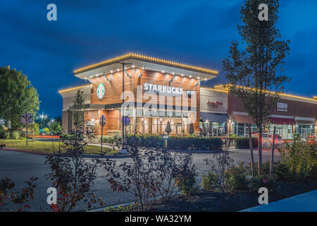 NEW HARTFORD, NEW YORK - AUG 16, 2019: Starbucks Coffee is an American chain of coffee shops, founded in Seattle. Stock Photo