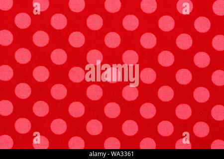 Close up of pink dot red background fabric. High quality Stock Photo
