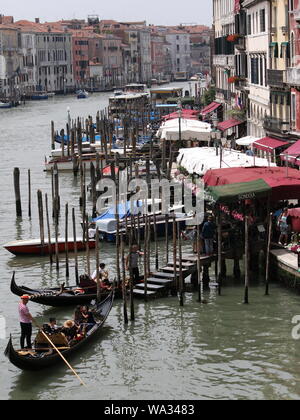 Gondalas moored on the Grand Canal, Venice, Italy Stock Photo