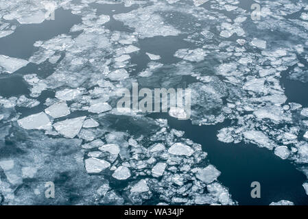 Broken up ice in a fjord seen from above Stock Photo