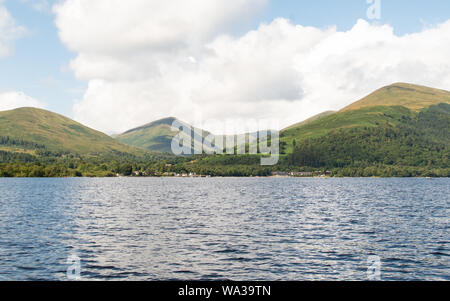 Luss, Glen Striddle hills, Beinn Dubh and the Luss Hills seen from the water of Loch Lomond, Scotland, UK Stock Photo