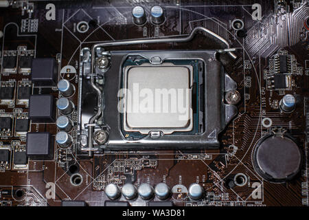 Main cpu in the socket. Concept of repairing or upgrading computer hardware Stock Photo