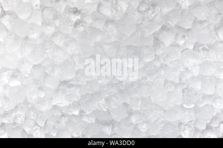 Ice cubes scattered on white for advertisement Stock Photo