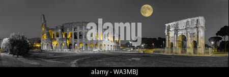 Full moon over Colosseum and Constantine Arch at night, colorkey, panorama, Rome, Lazio, Italy Stock Photo