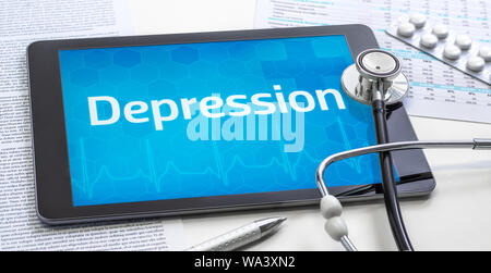 The word Depression on the display of a tablet Stock Photo