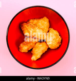 Deep Fried Chinese Style Sweet and Sour Chicken In Batter Stock Photo