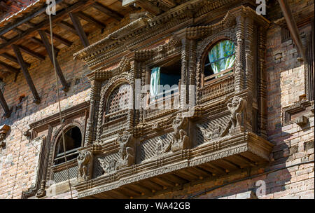 Kathmandu, Nepal  November 03,2017: beautiful wooden carved balcony in Kirtipur in the Kathmandu valley Stock Photo