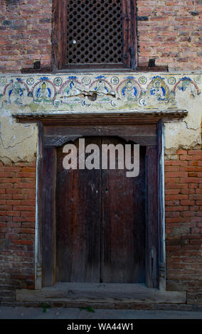 Kathmandu, Nepal  November 03,2017: wooden door with a painting of a indian  divinity above Stock Photo