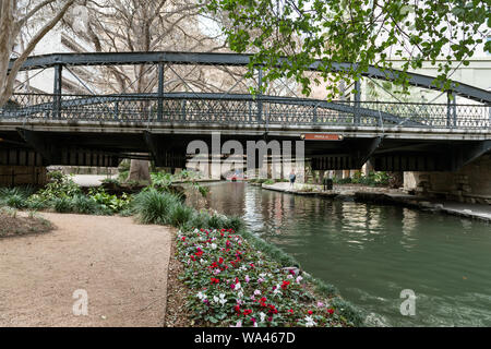 Bridge above the River Walk, also known as the Passeo del Rio, a network of walkways along the banks of the San Antonio River, one story beneath the streets of Downtown San Antonio, Texas Stock Photo