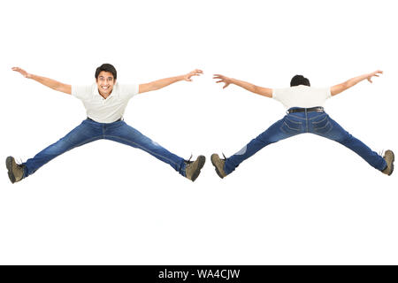 Multiple images of a young man jumping in air and smiling Stock Photo