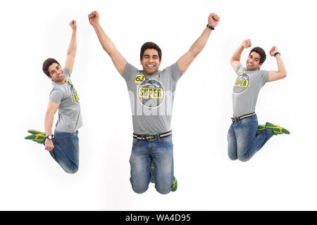 Multiple images of a young man jumping in mid air Stock Photo