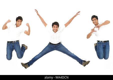 Multiple images of a young man jumping in mid air Stock Photo