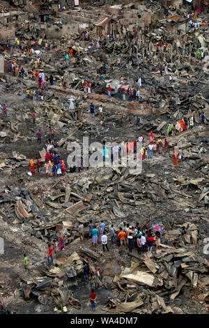 Dwellers at the fire devastated slum in Baunia badh area of Kalshi at ...