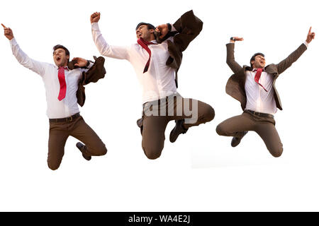 Multiple images of a businessman jumping in air Stock Photo