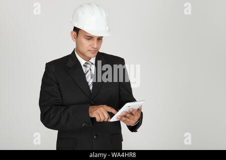 Businessman using a digital tablet Stock Photo