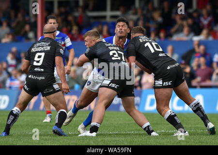 Wakefield, UK, 11 8 2019. 11 August 2019. Mobile Rocket Stadium, Wakefield, England; Rugby League Betfred Super League, Wakefield Trinity vs Hull FC;  Adam Tangata feels the force of the Hull FC defence.  Dean Williams/RugbyPixUK Stock Photo