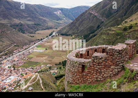 Inca ruins in Pisac archeological site surrounded by green Andes mountains in Sacred valley of the Incas, Peru, South America Stock Photo