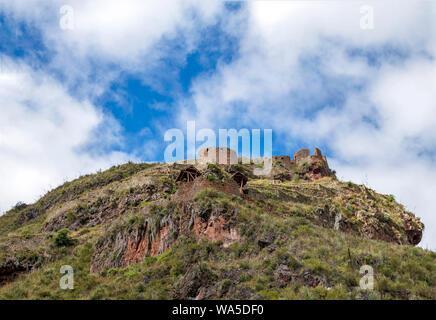 Inca ruins in Pisac archeological site surrounded by green Andes mountains in Sacred valley of the Incas, Peru, South America Stock Photo