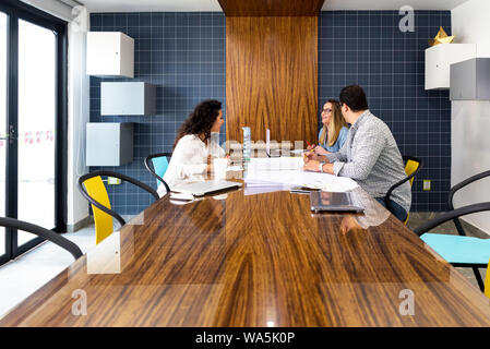 Creative business team working in coworking office Stock Photo