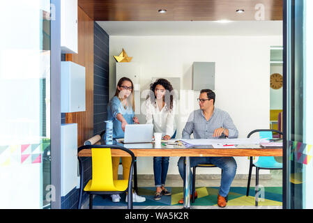 Creative business team working in coworking office Stock Photo