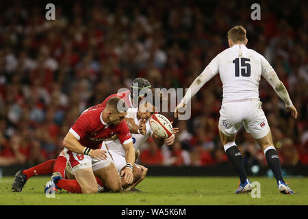Cardiff, UK. 17th Aug, 2019. Anthony Watson of England is tackled by Jake Ball of Wales. Wales v England, Under Armour summer series 2019 international rugby match at the Principality Stadium in Cardiff, Wales, UK on Saturday 17th August 2019. pic by Andrew Orchard/Andrew Orchard sports photography/ Alamy Live News PLEASE NOTE PICTURE AVAILABLE FOR EDITORIAL USE ONLY Credit: Andrew Orchard sports photography/Alamy Live News Stock Photo