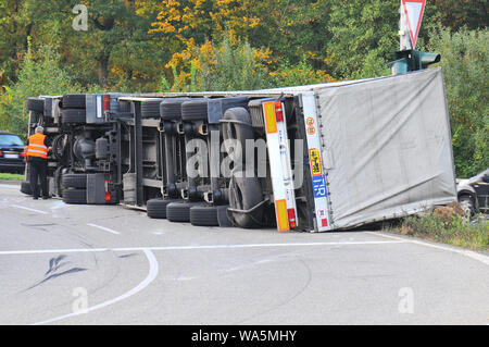 just fell over truck on motorway feeder road Stock Photo