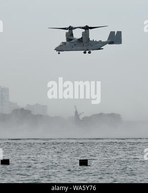 Chicago, Illinois, USA. 17th Aug, 2019. One of the two US Marine Corp. MV-22 Ospreys hovers over Lake Michigan. The aircraft takes off as a helicopter and the engines rotate 90-degrees to become an airplane. Saturday was the first of two days of Chicago's 61st annual Air and Water Show along the shore of Lake Michigan, August 17, 2019. Credit: Rob Dicker/ZUMA Wire/Alamy Live News Stock Photo