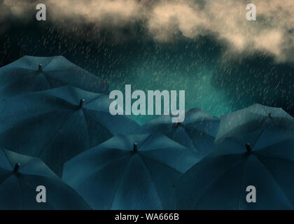 Rain and Clouds on black umbrella. Weather Concept Stock Photo
