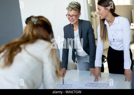 Group of business people collaborating in office Stock Photo