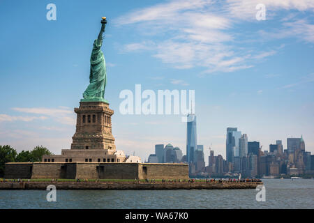 New York City, view of the Statue Of Liberty against the Lower Manhattan skyline, NYC, USA Stock Photo