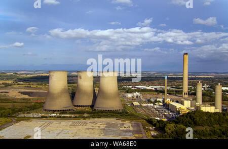 A view of the three remaining cooling towers at Didcot power station in Oxfordshire ahead of their demolition on Sunday and the chimney (right) which will demolished in the autumn. Stock Photo