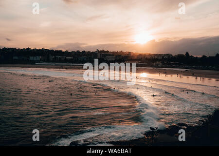 Warm sunset over Bondi Beach on a cold winter afternoon. Stock Photo