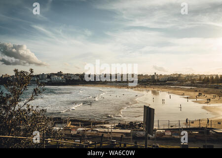 Sunset over Bondi Beach on a winter Sunday afternoon. Shot from North Bondi Park. Stock Photo