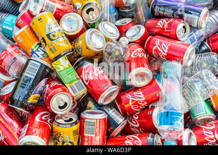 Adelaide, South Australia - May 6, 2018: Pile of soft drink cans and plastic bottles collected after public event and ready for recycling Stock Photo