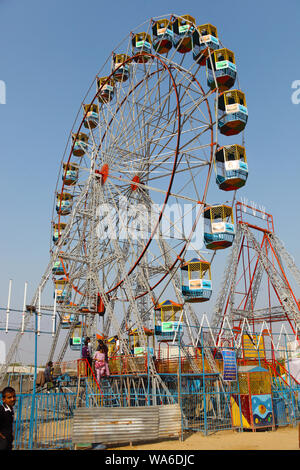 Ferris wheels in a fair, Gurgaon, Haryana, India Stock Photo