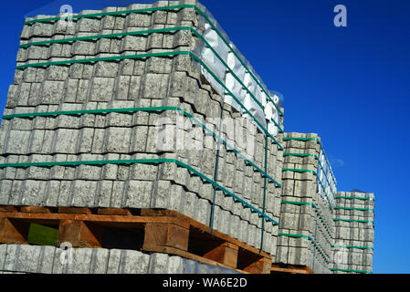 new cobblestons on pallet waiting for workers Stock Photo