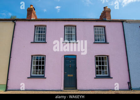 Fishguard, Wales, UK - Aug 12, 2019: A pink house in the old port of Fishguard Stock Photo