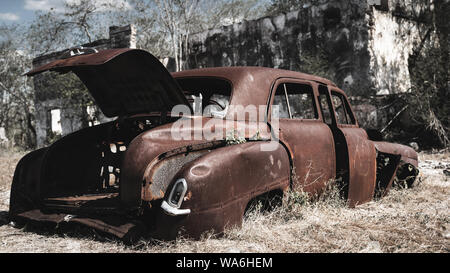Old american car found in a ghost town in Mexico, this looked so movie like, I had to stop and enjoy the moment, and the scene. Stock Photo