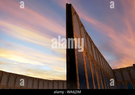 Tall concrete separation barrier wall between Northern Gaza strip and Netiv Haasara Jewish settlement, Southern Israel Stock Photo