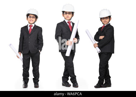 Multiple images of a Boy pretending to be an architect and holding blueprints Stock Photo