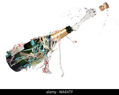 Champagne bottled festooned with streamers popping open, cork and drink fly out (white background) Stock Photo