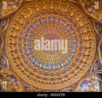 Intricate patterned ceiling in Tilla Kari Madrasah in Uzbekistan Stock Photo