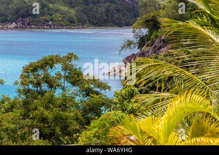 Panoramic view at the landscape on Seychelles island Mahé with turquoise water and green mountains Stock Photo