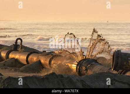 Sand sculpture works, Walcott, Norfolk, East Anglia, UK Stock Photo