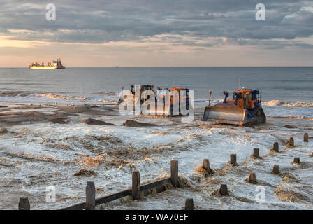 Sand sculpture works, Walcott, Norfolk, East Anglia, UK Stock Photo