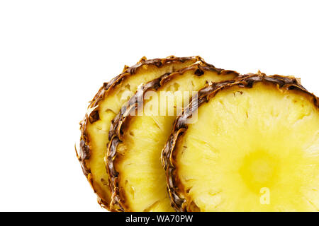 sliced ripe pineapple close up on white background Stock Photo