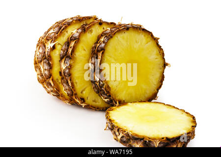sliced ripe pineapple close up on white background Stock Photo